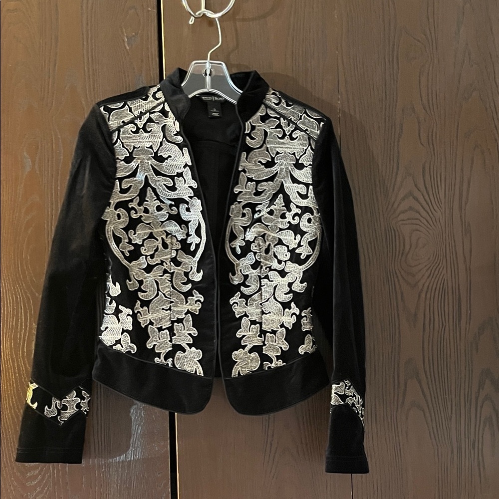 White House Black Market long sleeved black velvet jacket with designs. Size 2.